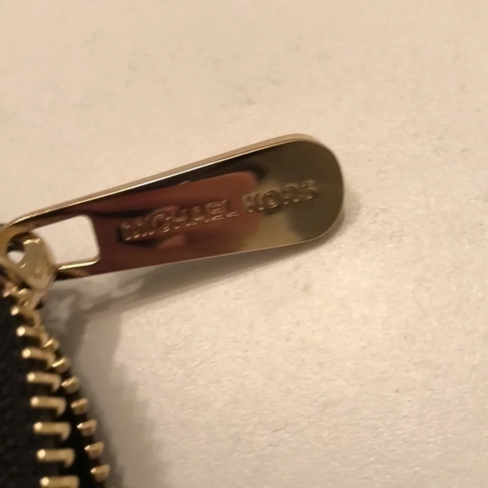Michael kors black studded heart wristlet clutch